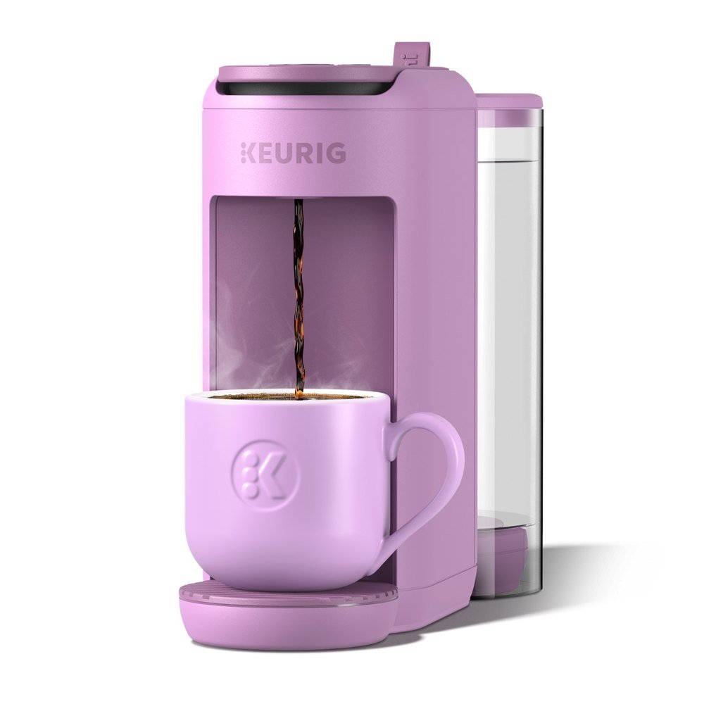 Keurig K-Mini Mate Plus coffee maker in lilac with its clear 50 oz water reservoir on the side